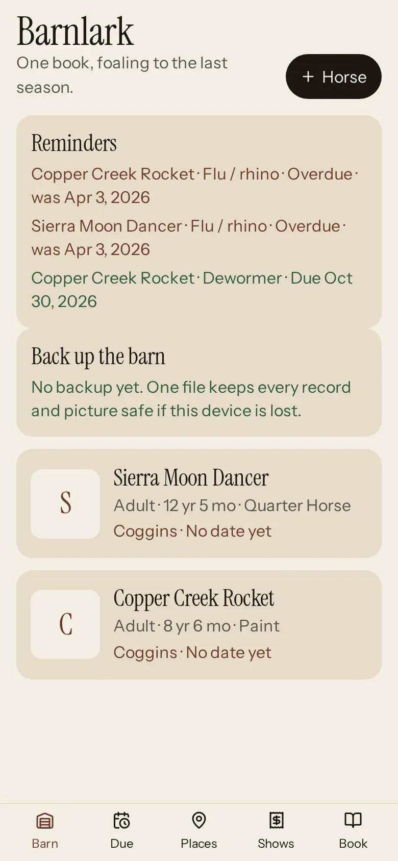 The Barnlark Barn screen: a Reminders list of overdue and upcoming care, a prompt to back up the barn, and two sample horses, Sierra Moon Dancer, a Quarter Horse, and Copper Creek Rocket, a Paint, each with no Coggins date entered yet.